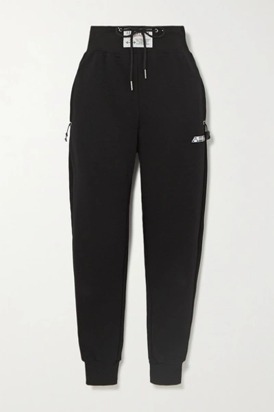 Shop Adam Selman Sport Cotton-blend Jersey Track Pants In Black