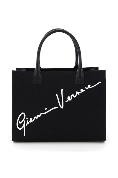 Shop Versace Canvas Tote Bag With Logo Signature In Black,white