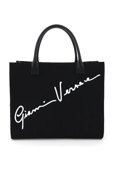 Shop Versace Canvas Tote Bag With Logo Signature In Black,white