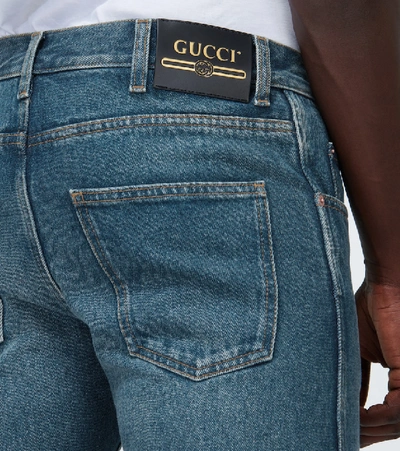 Shop Gucci Washed Denim Tapered Jeans In Blue