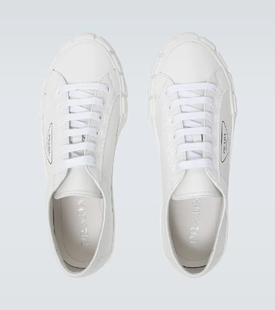 Shop Prada Wheel Low-top Sneakers With Logo In White