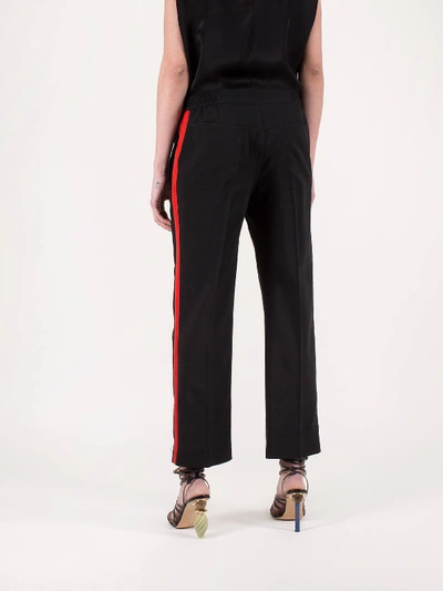 Shop Haider Ackermann Casual Trousers Cosmos Black Red