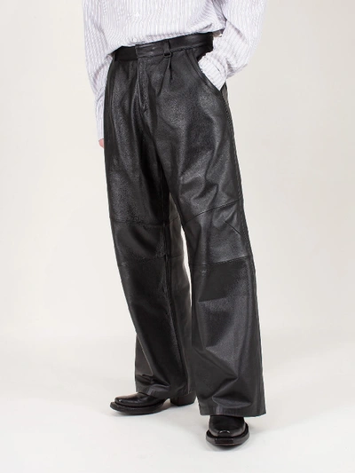 Shop Ader Error Oversized Leather Trousers In Black