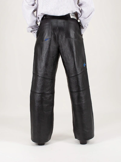 Shop Ader Error Oversized Leather Trousers In Black