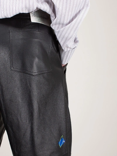 Shop Ader Error Oversized Leather Trousers In Black