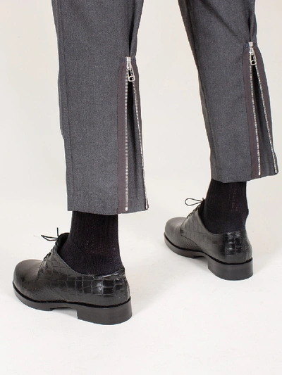 Shop Oamc Cropped Zip Pants In Grey