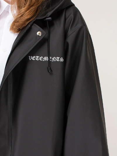 Shop Vetements Rubber Logo Raincoat In Black