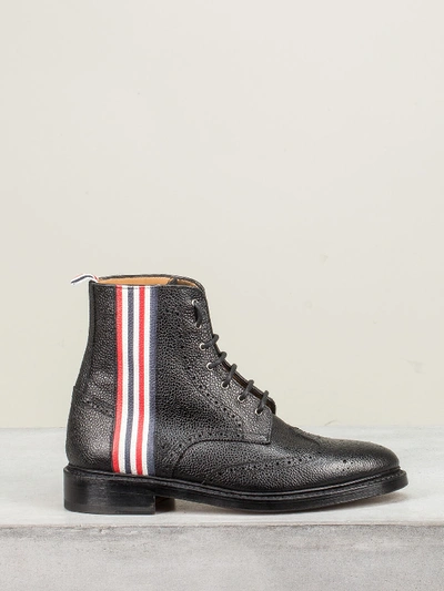 Shop Thom Browne Classic Wingtip Boot 4 Bar Emboss Leather Sole In Pebble Grain In Black