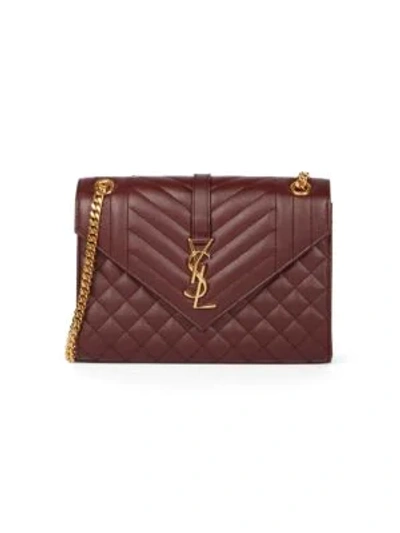 Shop Saint Laurent Medium Envelope Monogram Matelassé Leather Shoulder Bag In Rouge Legion