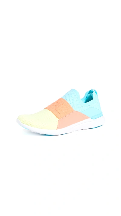 Shop Apl Athletic Propulsion Labs Techloom Bliss Sneakers In Bahama Blue/laser Red/citrus