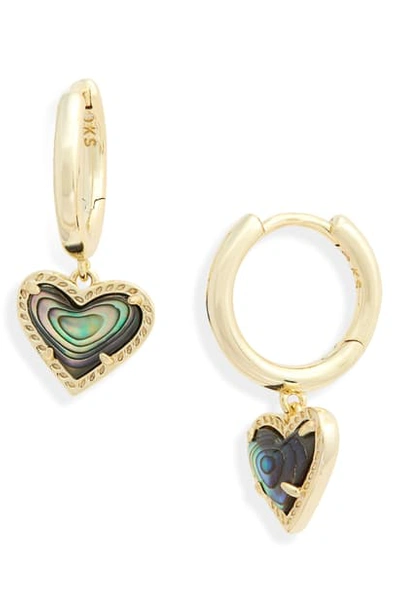 Shop Kendra Scott Ari Heart Huggie Hoop Earrings In Abalone Shell