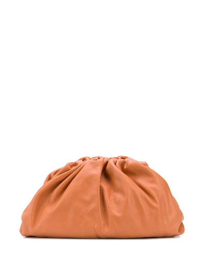 Shop Bottega Veneta The Pouch Leather Handbag In Orange