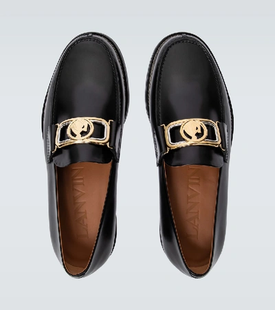 Shop Lanvin Swan Loafers With Logo Buckle In Black