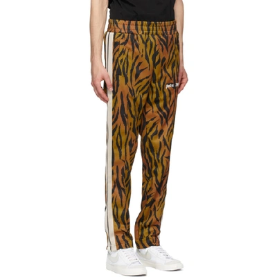 Shop Palm Angels Black And Orange Tiger Track Pants