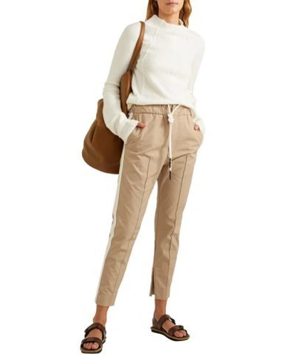 Shop Bassike Pants In Beige