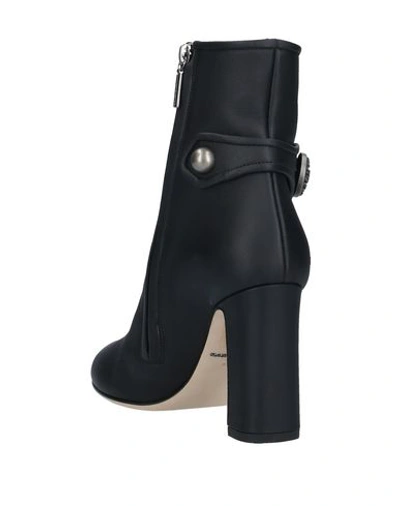 Shop Dolce & Gabbana Ankle Boots In Black