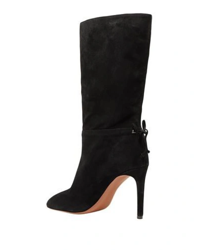 Shop Alaïa Knee Boots In Black