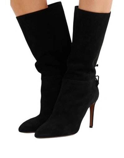 Shop Alaïa Knee Boots In Black