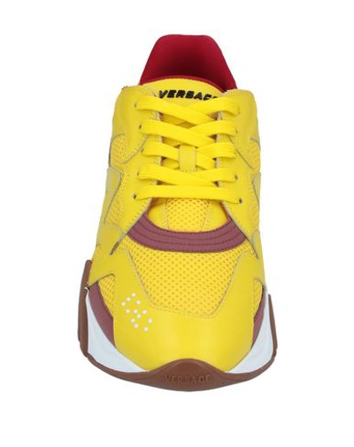 Shop Versace Sneakers In Yellow