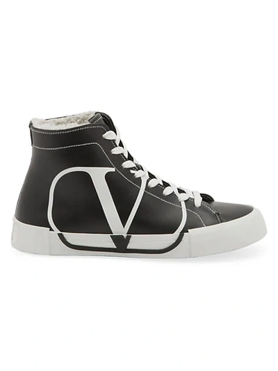 Shop Valentino Leather Shearling High-top Sneakers In Black White