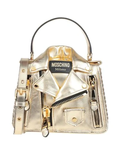 Shop Moschino Handbag In Platinum
