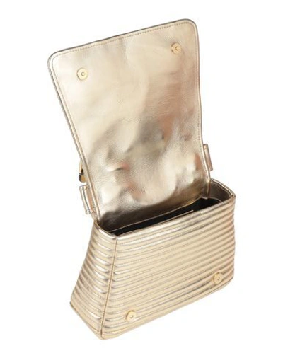 Shop Moschino Handbag In Platinum
