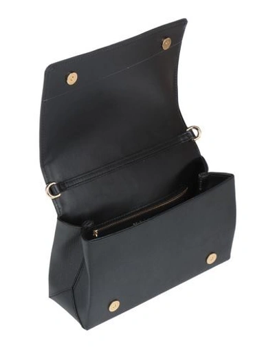 Shop Moschino Cross-body Bags In Black