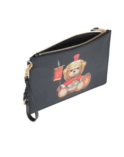 Shop Moschino Handbag In Black