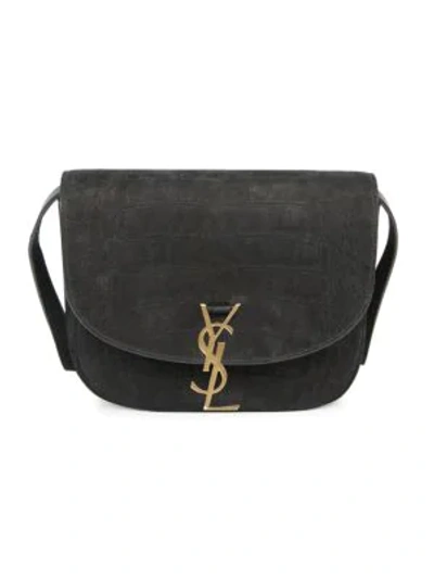 Shop Saint Laurent Kaia Croc-embossed Suede Saddle Bag In Nero