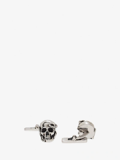 Shop Alexander Mcqueen Skull And Snake Cufflinks In Antique Silver