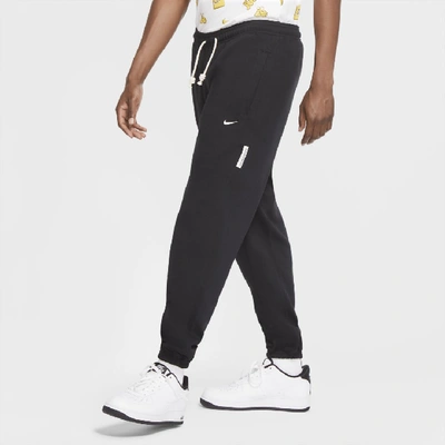 Shop Nike Men's Standard Issue Dri-fit Basketball Pants In Black