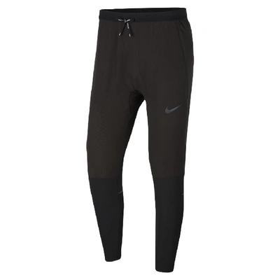 Shop Nike Men's Swift Running Pants In Black