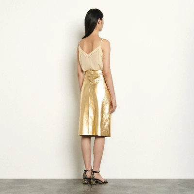 Shop Sandro Metallic Leather Skirt In Gold