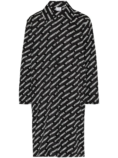 Shop Vetements Logo Print Raincoat In Black