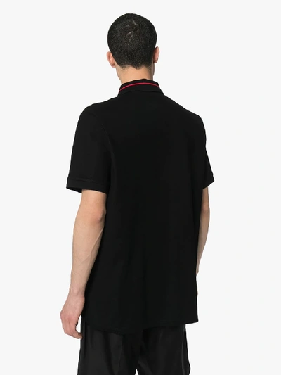 Shop Burberry Jetford Stripe Cotton Polo Shirt In Black