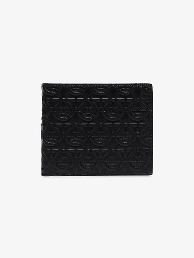 Shop Ferragamo Black Embossed Leather Bifold Wallet