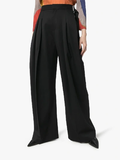 Shop Jw Anderson Buckled Wide Leg Trousers In Black