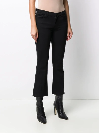 Shop J Brand Selena Mid-rise Flared Jeans In Black