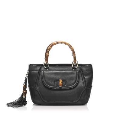 Shop Gucci Bamboo Tassel Leather Handbag In Black
