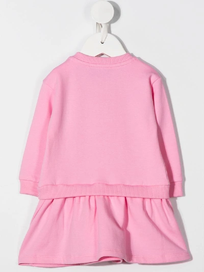 Shop Moschino Logo Print Jumper Dress In Pink