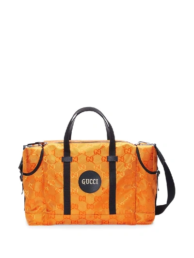 Shop Gucci Off The Grid Gg Duffle Bag In Orange