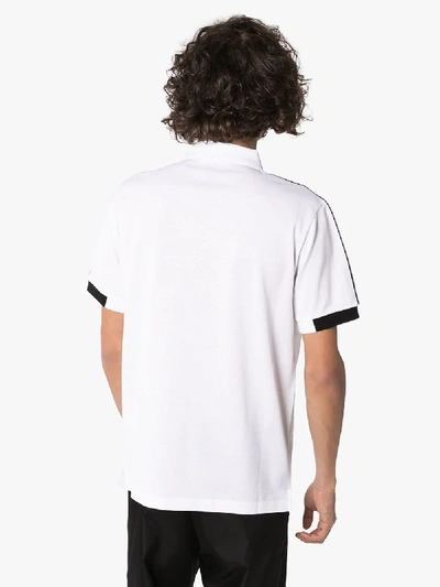 Shop Prada Poloshirt Mit Seitlichen Streifen In Weiss