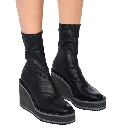 Shop Clergerie Bliss Leather Wedge Ankle Boots In Black