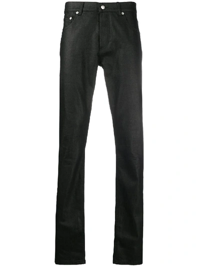 Shop Alexander Mcqueen Slim-fit Coated Jeans In Black