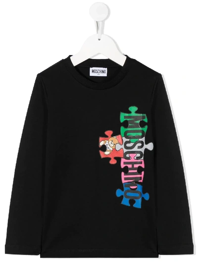 Shop Moschino Logo Puzzle-print T-shirt In Black
