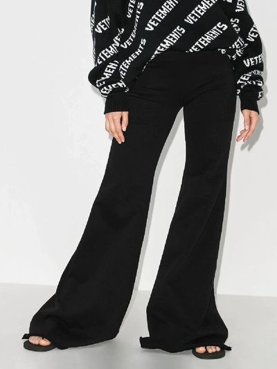 Shop Vetements High Waist Flared Trousers In Black