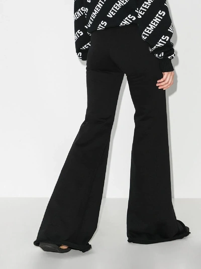 Shop Vetements High Waist Flared Trousers In Black