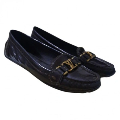 Pre-owned Louis Vuitton Upper Case Patent Leather Flats In Black