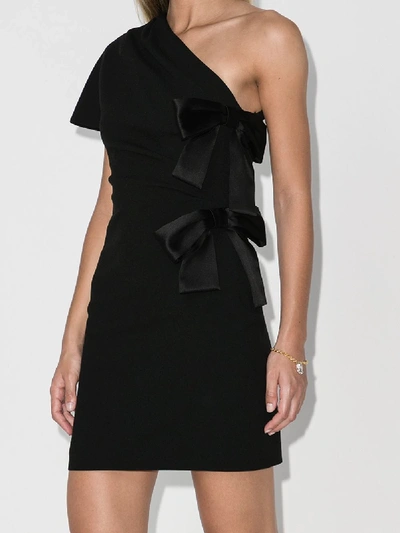 Shop Saint Laurent One Shoulder Bow Mini Dress In Black