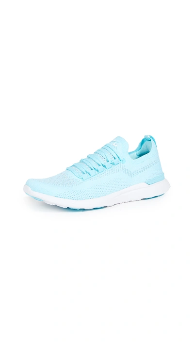 Shop Apl Athletic Propulsion Labs Techloom Breeze Sneakers In Bahama Blue/metallic Silver/wh
